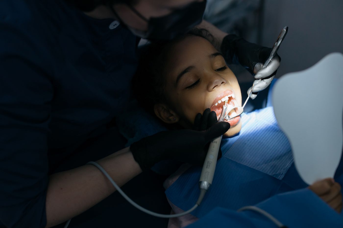 Child having a gentle dental check-up